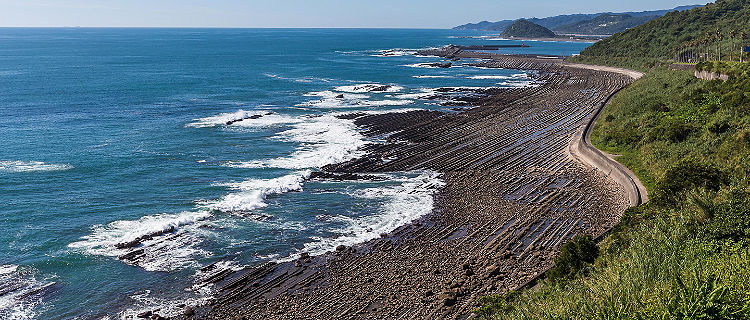 The Nichinan coastline viewpoint with dark volcanic sand in Miyazaki, Japan
