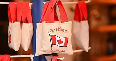 Tote bags with the Canadian flag for sale in a souvenir shop in Montreal, Quebec