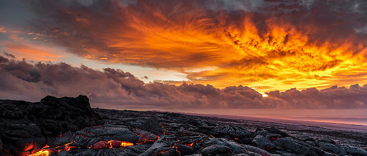 Lava flow entering the ocean from the Kilauea volcano in Mount Kilauea, Hawaii