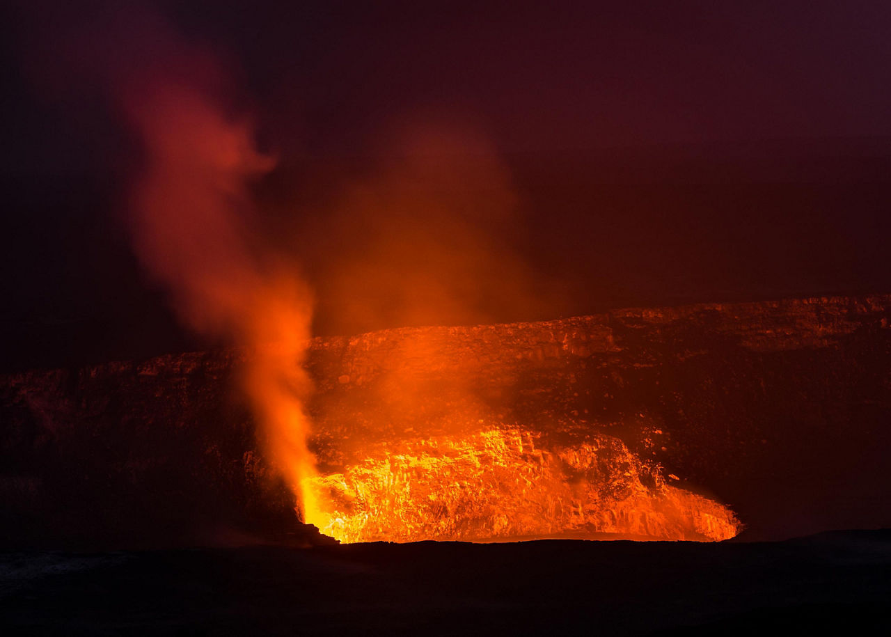 Sea view of the glowing lava from the Kilauea volcano in Mount Kilauea, Hawaii
