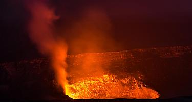 Sea view of the glowing lava from the Kilauea volcano in Mount Kilauea, Hawaii