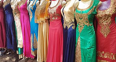Colorful traditional Indian dresses selling at the street vendors in Mumbai, India