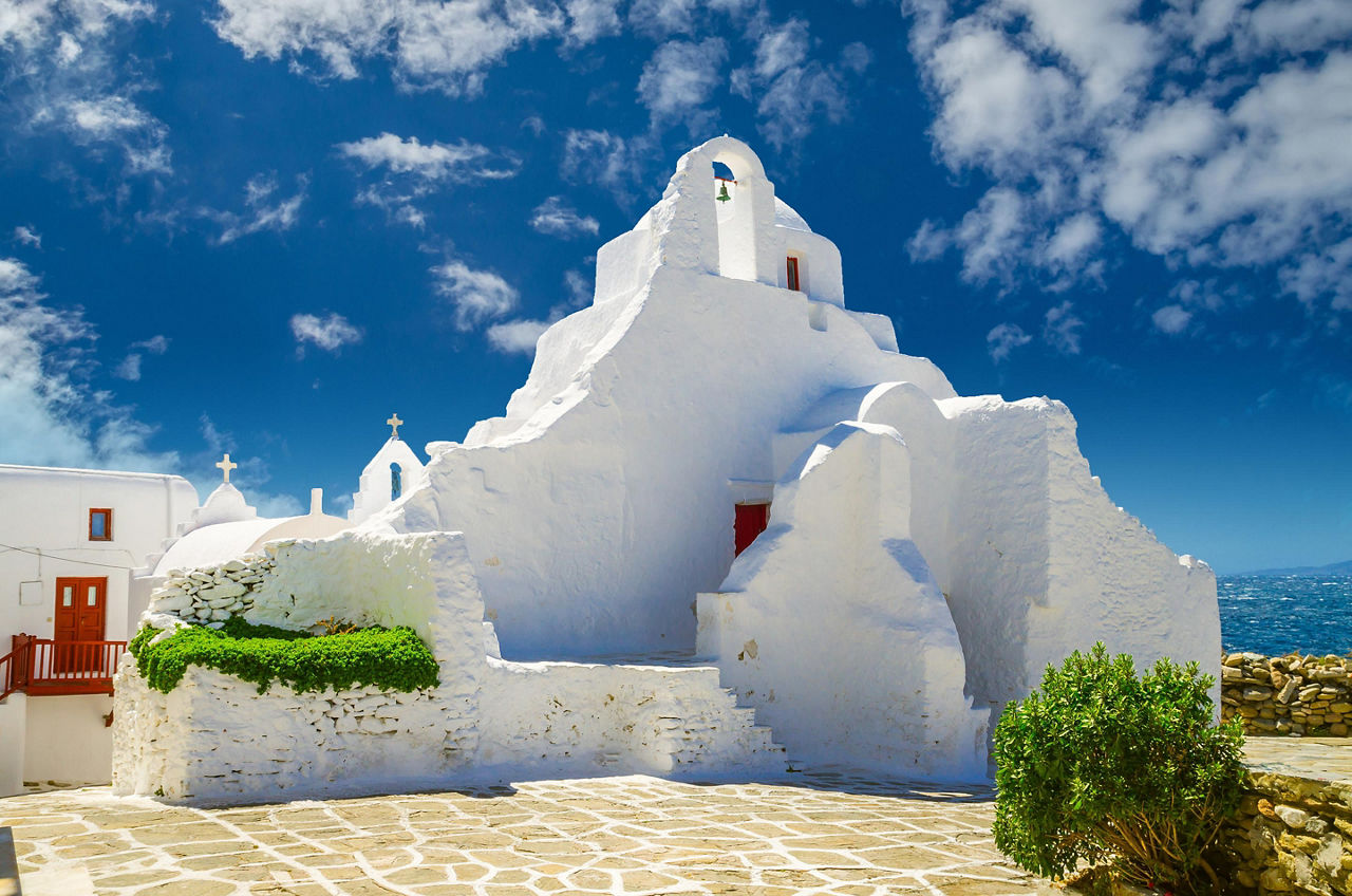 A beautiful old white chapel, the Panagia Paraportiani Church, in Mykonos, Greece