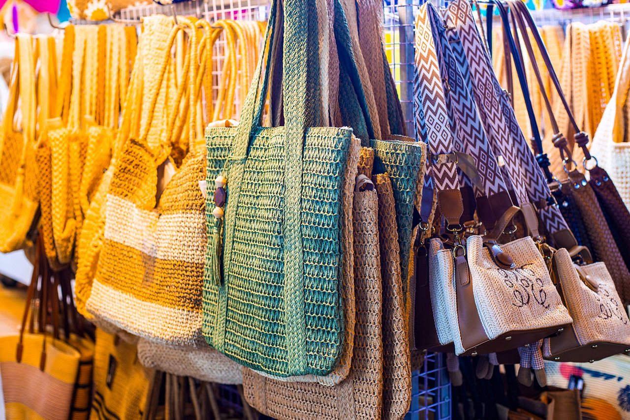 A vibrant display of handmade traditional woven artistan bags