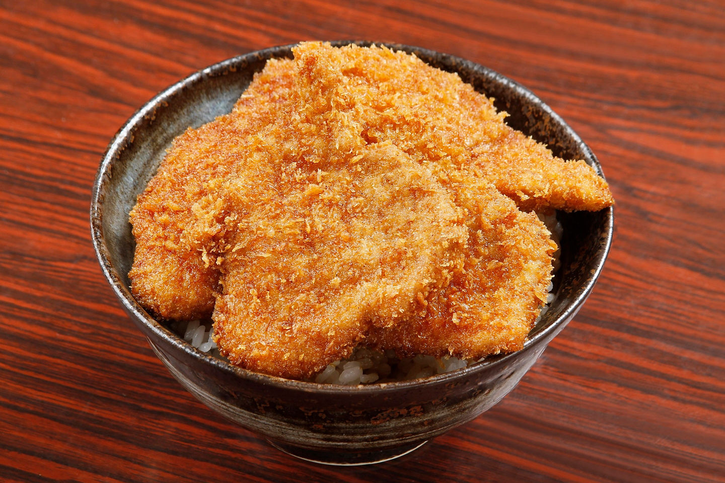 Bowl of tarekatsu donbori, a fried pork cutlet over rice with a salty-sweet sauce. - Niigata, Japan