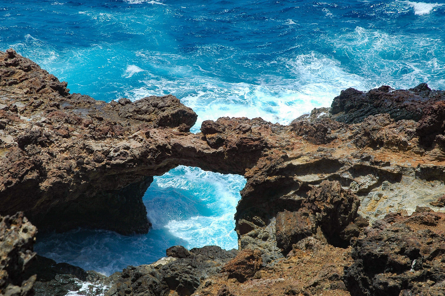 Waves crash against Aruba’s Natural Bridge. - Oranjestad, Aruba