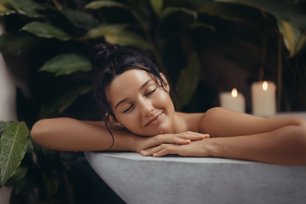 A woman relaxing in a luxrious spa bath. Orlando, Florida. 