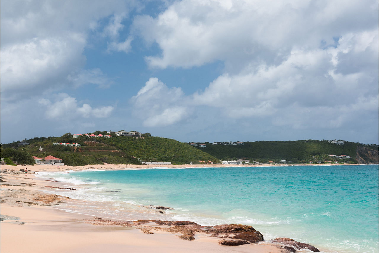 Baie Rouge, the pink sand beach, one of the tourism destinations of Saint Martin island