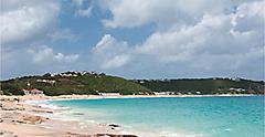 Baie Rouge, the pink sand beach, one of the tourism destinations of Saint Martin island