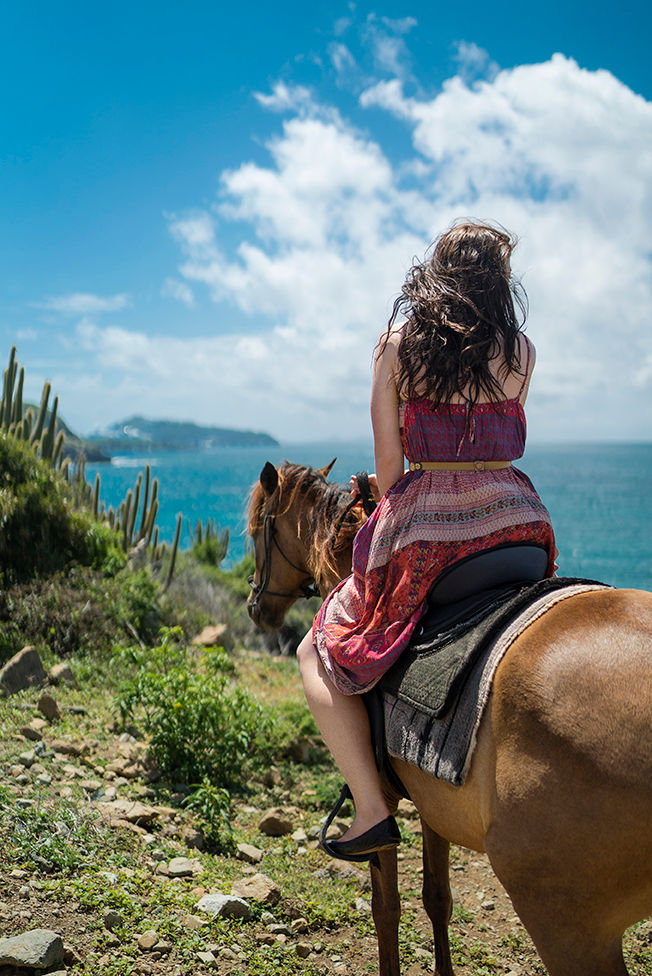 Girl Horseback Riding with a View of the Ocean, Philipsburg, St. Maarten