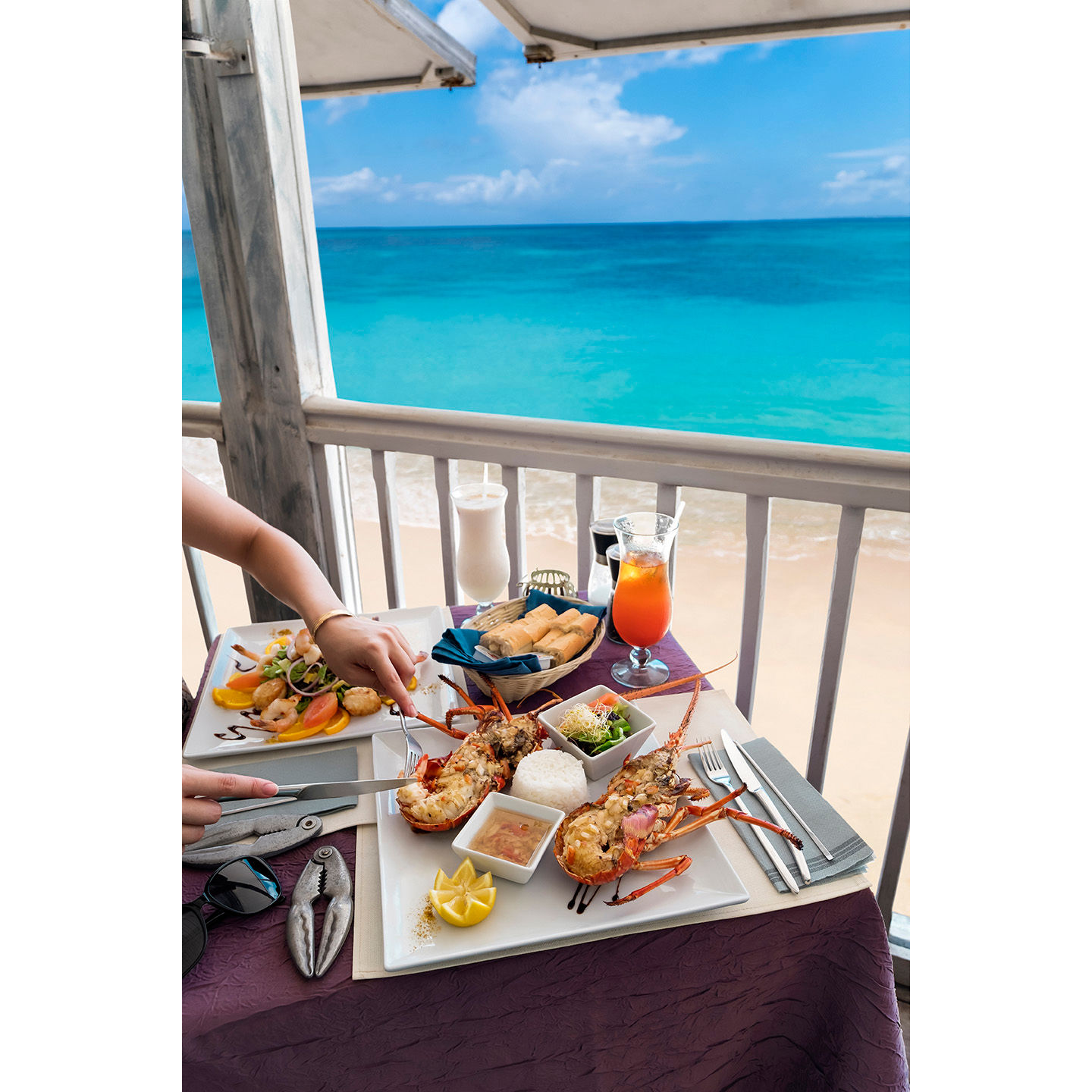 St. Maarten seafood platters feature fresh lobster, shrimp, fish, and classic rice-and-beans sides. - Philipsburg, St. Maarten