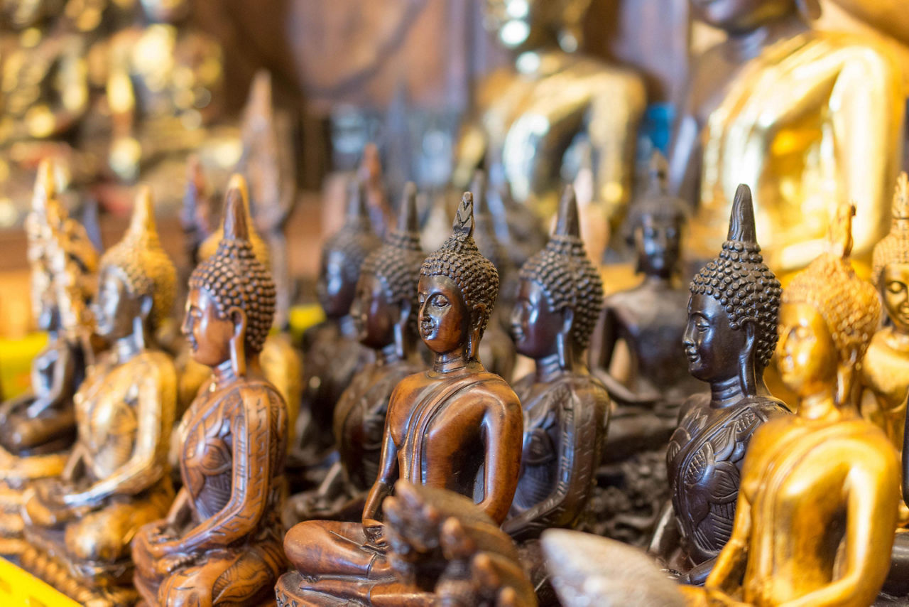 Traditional buddha souvenirs sold in Thailand