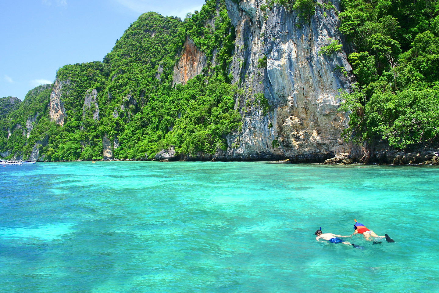 Speedboat island-hopping from Phuket offers snorkeling, white-sand beaches, dramatic cliffs, and iconic James Bond Island. - Phuket, Thailand