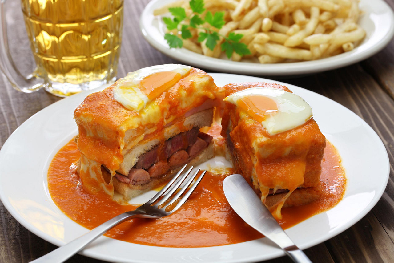 Homemade francesinha, sandwich with ham and sausage, from a restaurant in Porto, Portugal