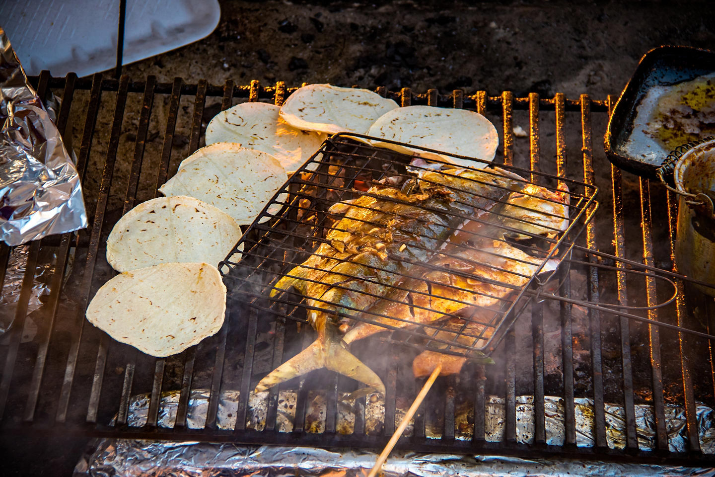 Grilled fish served with warm tortillas (Pescado Zarandeado). - Puerto Vallarta, Mexico