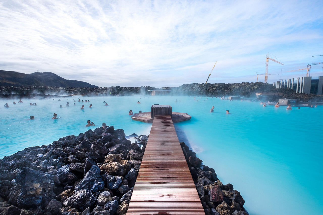 People enjoying the Blue Lagoon geothermal spa in Reykjavik, Iceland
