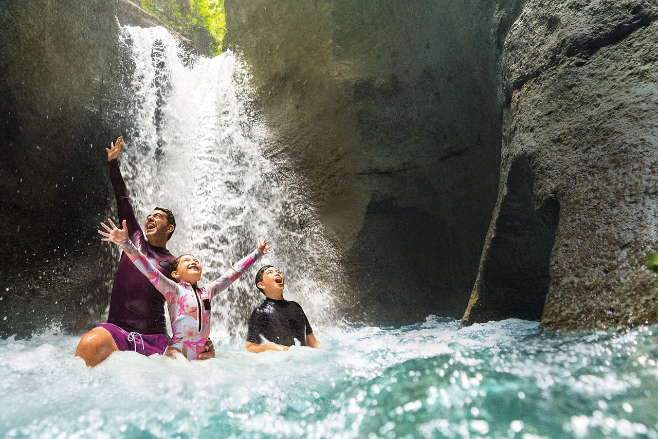 Family Enjoying the Waterfall, Dominica 