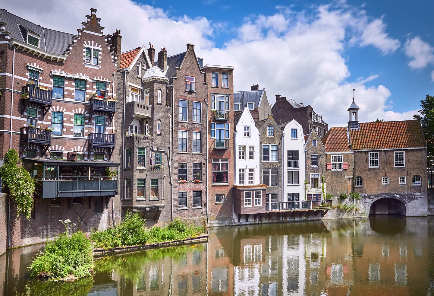 Delfshaven showcases Rotterdam’s 17th-century charm with canals, historic buildings, and a peaceful harbor atmosphere. - Rotterdam, Netherlands