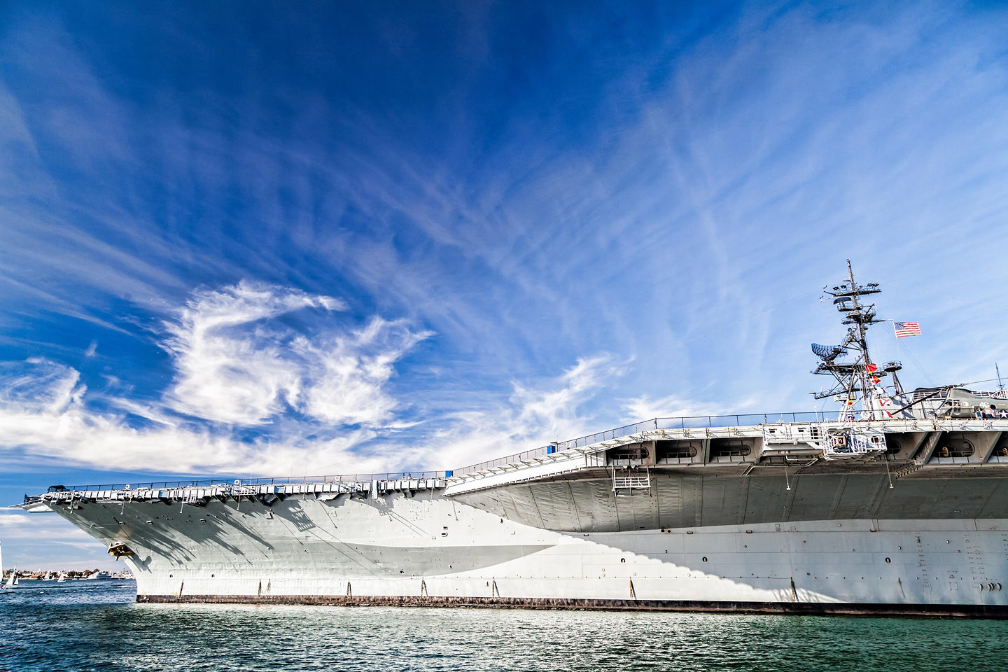 USS Midway aircraft carrier under beautiful sky. - San Diego, California