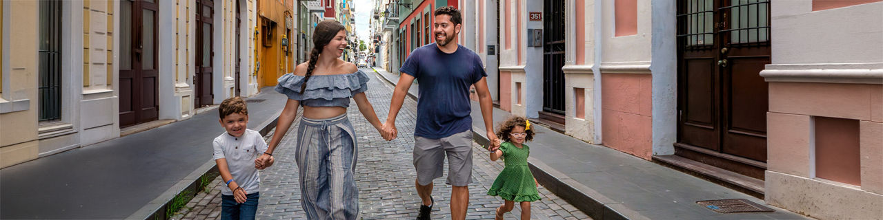 family walking cobblestone streets san juan puerto rico 1920 480