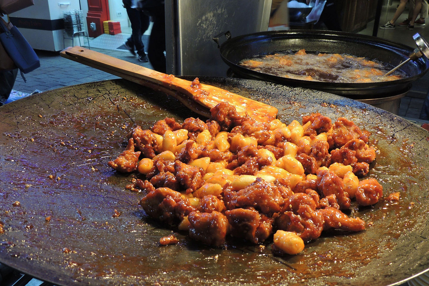 Crispy Korean dakgangjeong glistens with sweet heat and sesame. - Seoul, South Korea