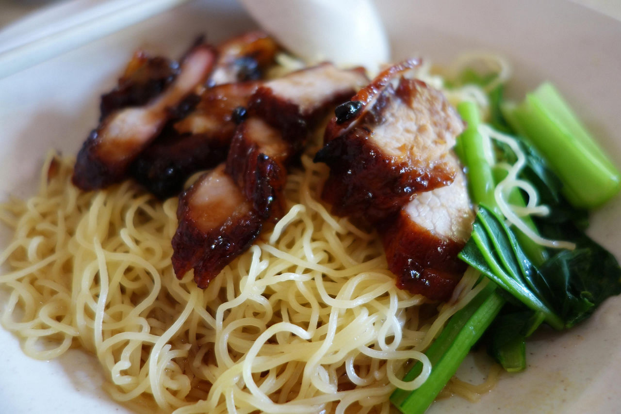 Wantan Mee, popular street food noodles with bbq pork, in Singapore