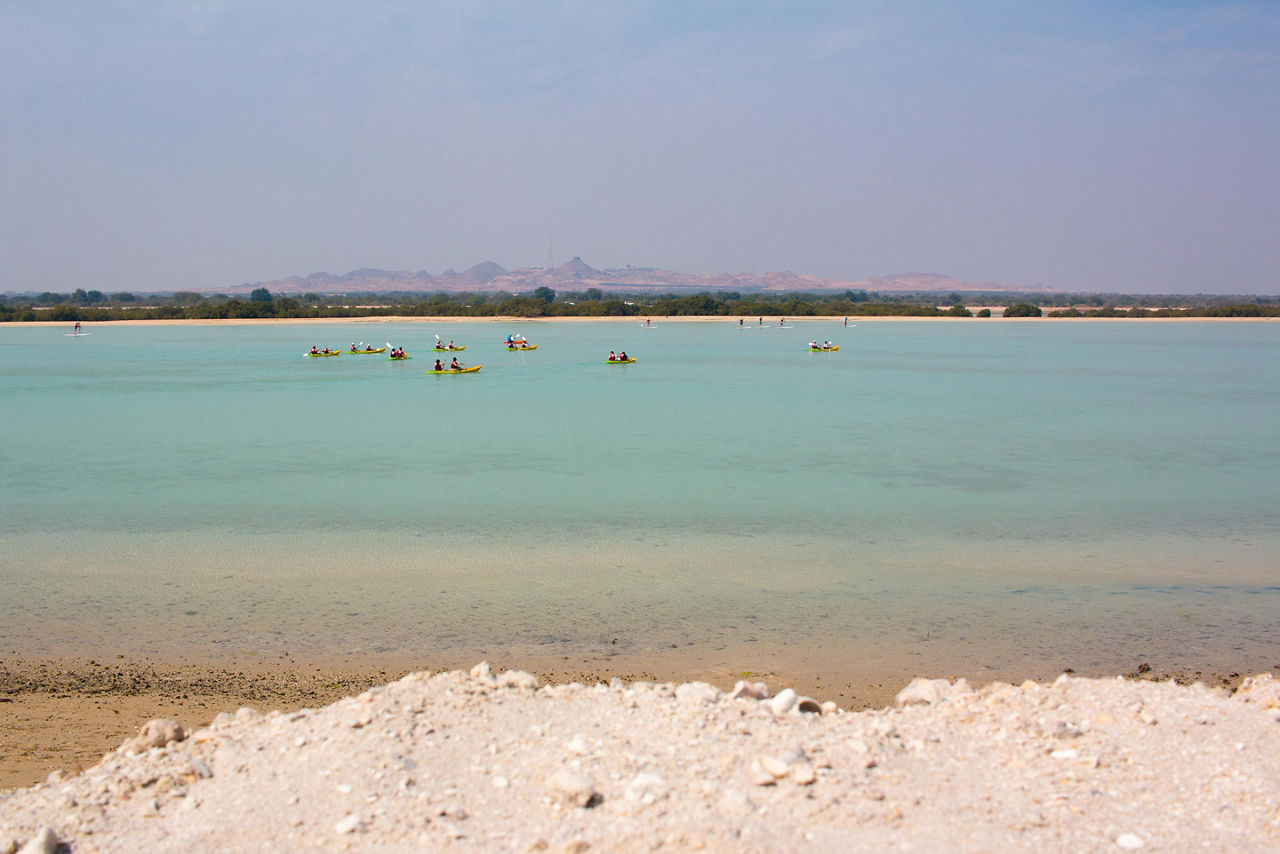 Sea landscape with canoes in the background on Sir Bani Yas, United Arab Emirates