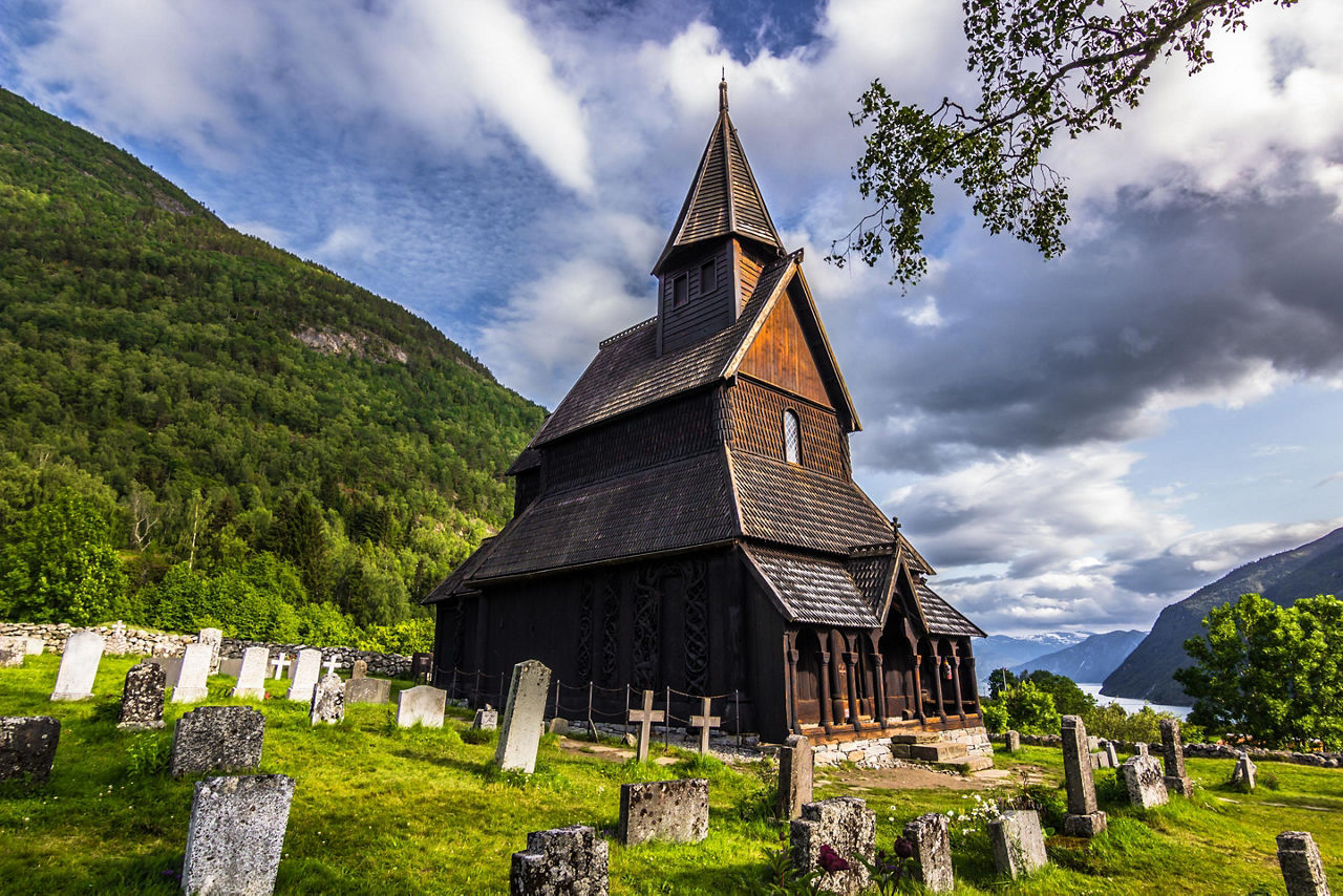 The Urnes Stave Church with its surrounding cemetery in Norway