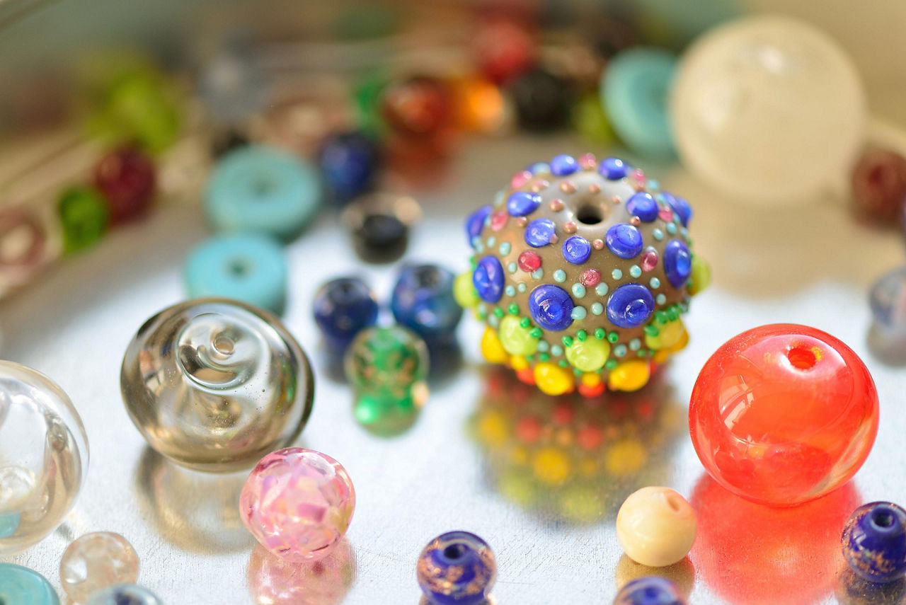 A pile of glass beads of different colors for sale in St. George's, Bermuda