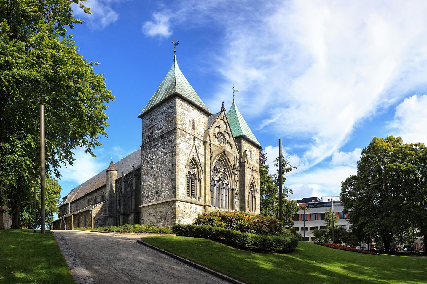 Olden Church offers a serene glimpse of rural Norway’s heritage amid stunning mountain scenery. - Olden, Norway
