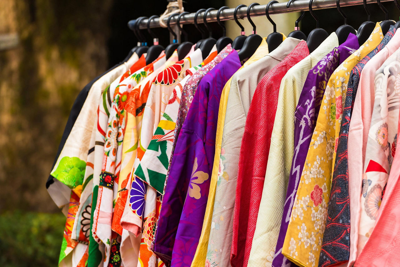 An assortment of kimonos on a rack in Japan