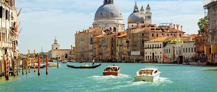 Boats travelling down the Grand Canal in Venice, Italy