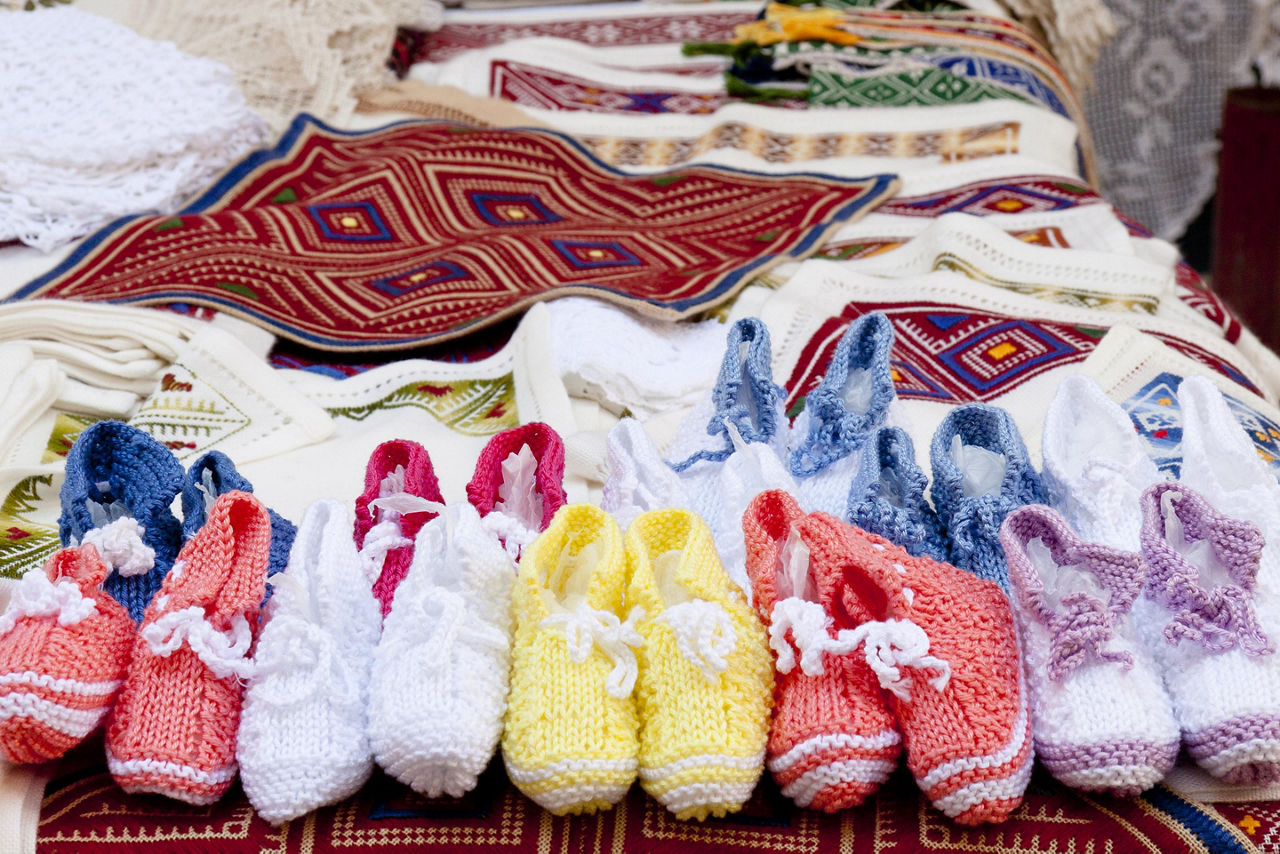 Table cloths and knit goods at a street market in Croatia