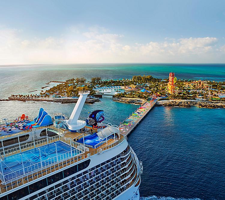 WN, Wonder of the Seas, aerial, Perfect Day at CocoCay, broad view of the island with Daredevil's Peak in distance, ship docked, pier, ocean horizon,