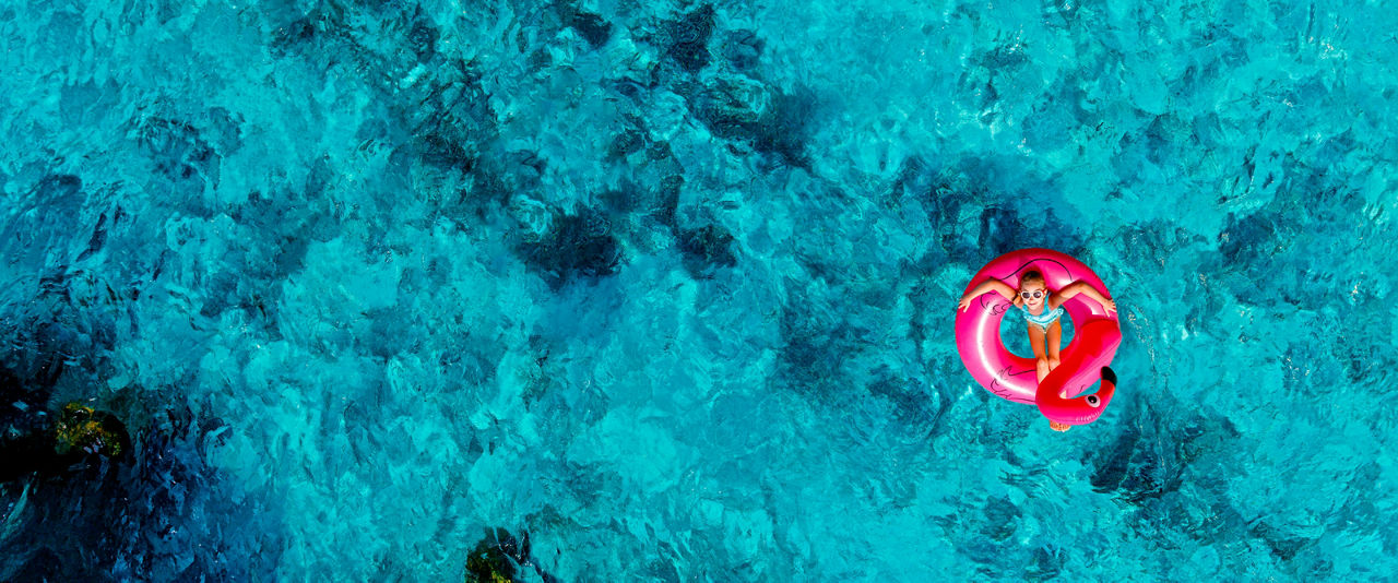 girl laying on float hp
