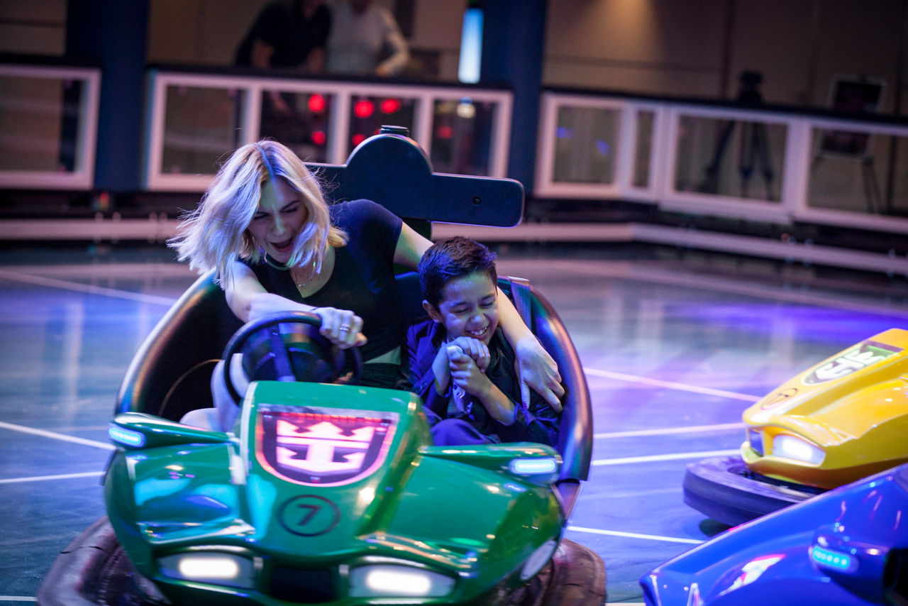 Mon and Son Driving and Enjoying the Bumper Cars