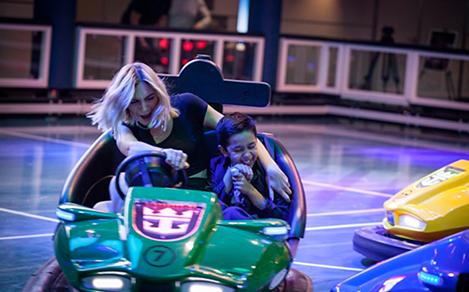 Mon and Son Driving and Enjoying the Bumper Cars