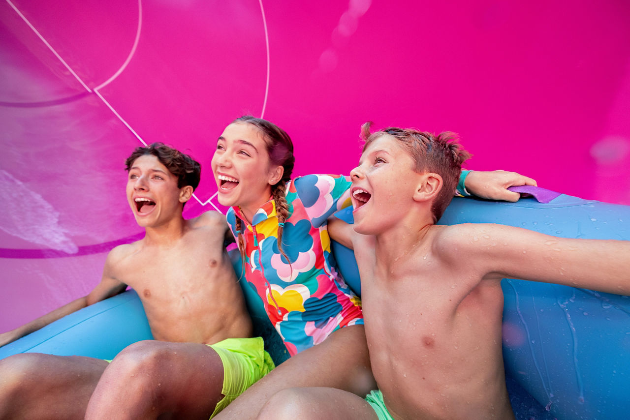 Friends Sliding Down Hurricane Hunter 