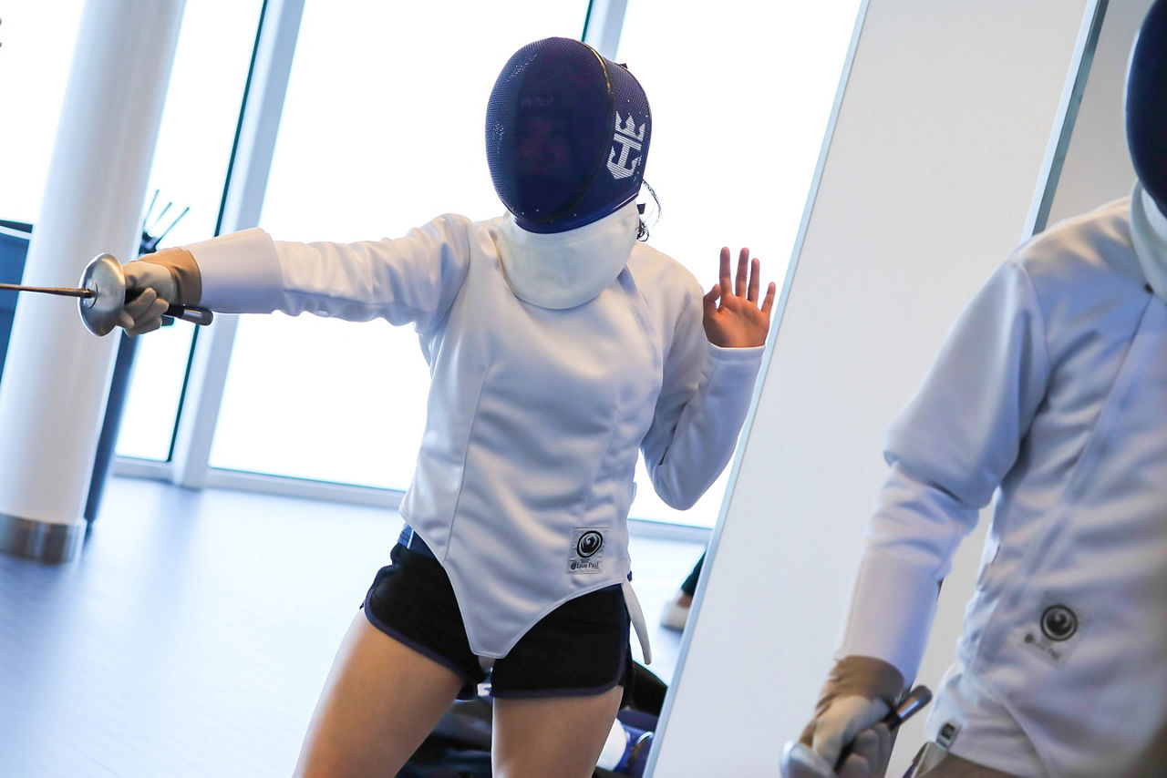 Spectrum of the Seas Woman Fencing with Sword