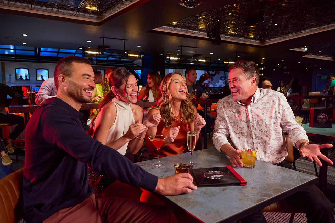 Friends Enjoying Performance at the Dueling Pianos