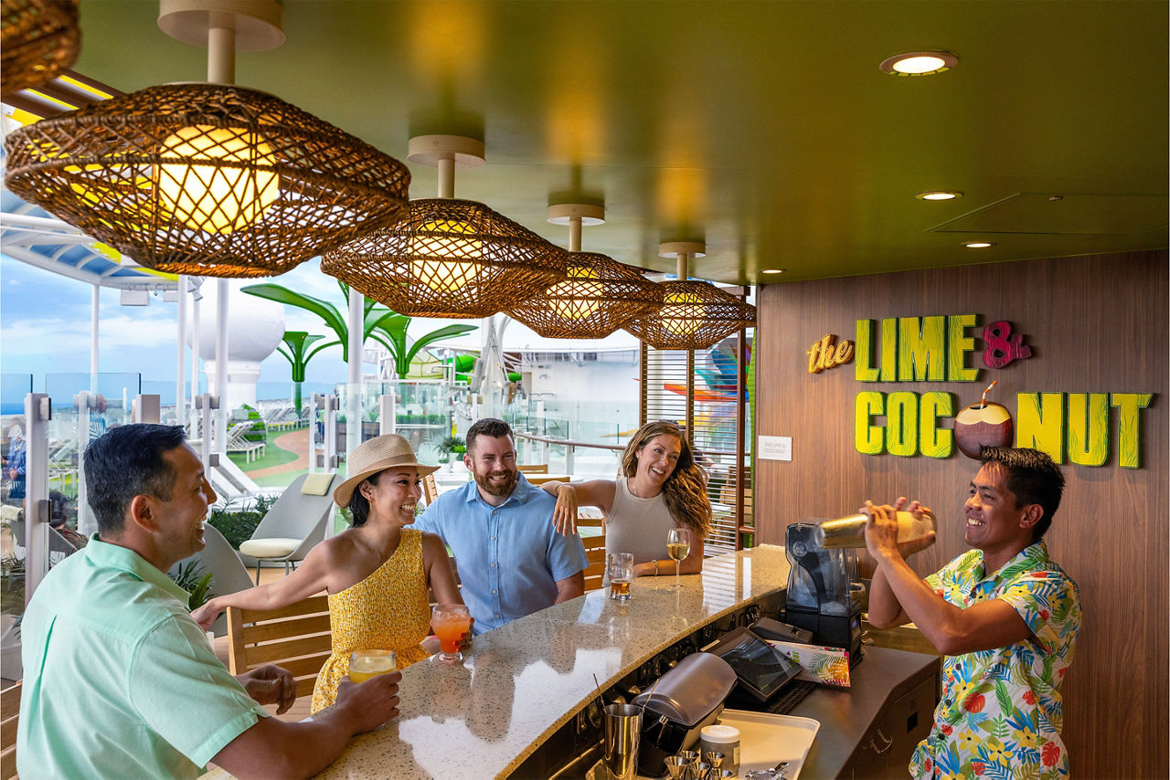 Drinks being served by the bar tender at Lime and Coconut