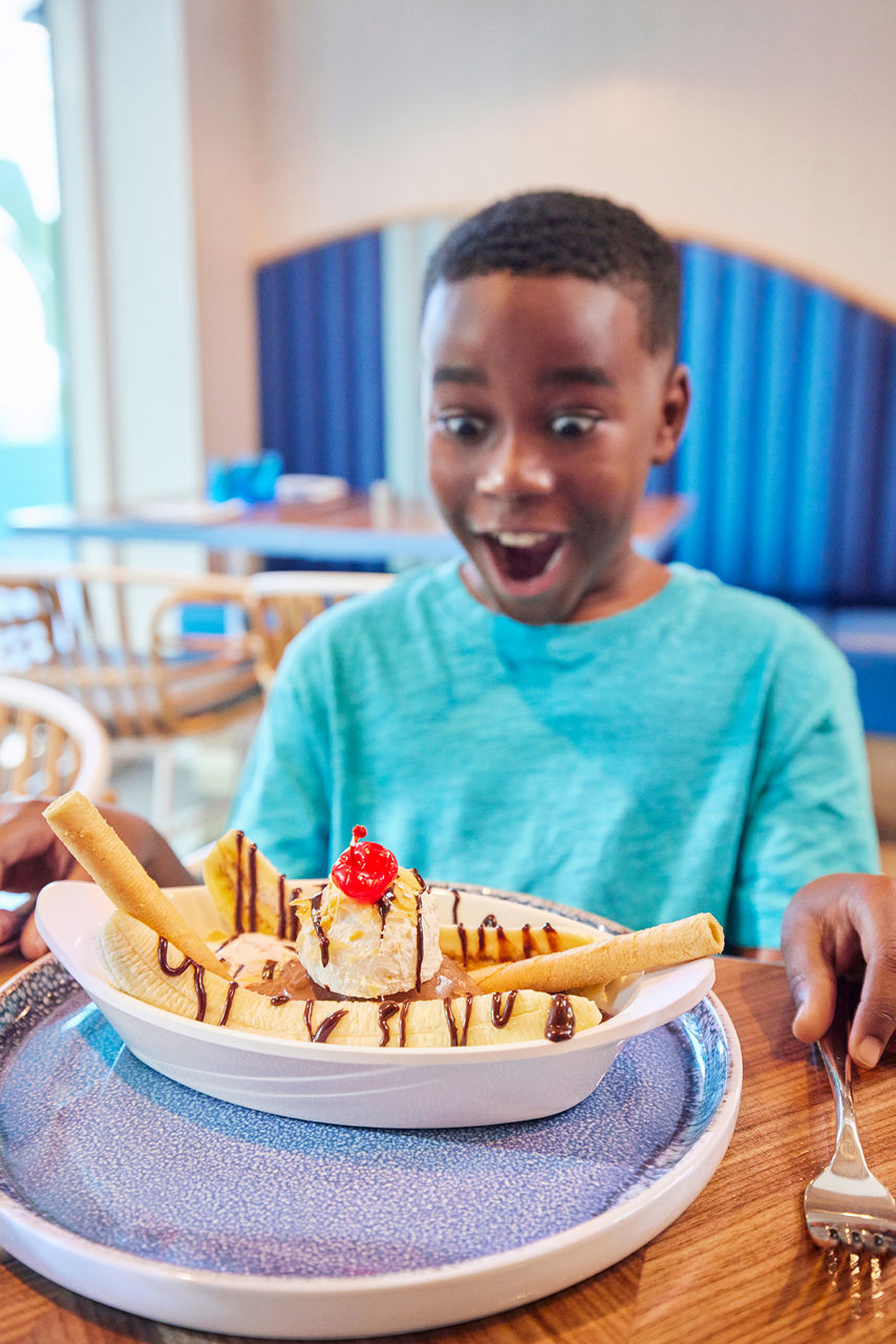 Kid Excited for His Sundae in Pier 7