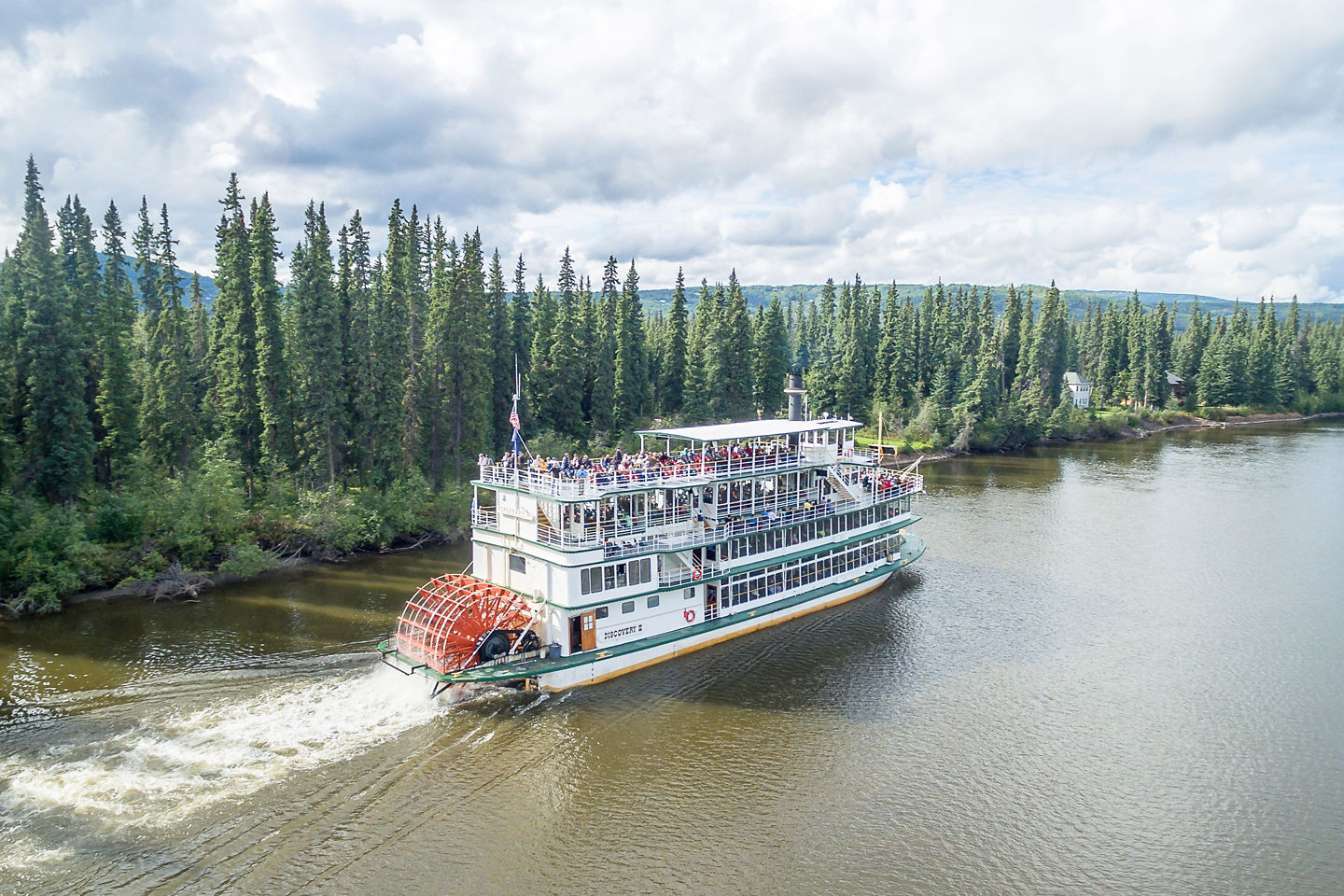 Riverboat glides through Fairbanks waterways. - Fairbanks, Alaska