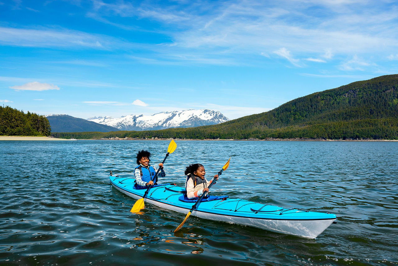Mother and Daughter Enjoying a Kayak Tour in Alaska