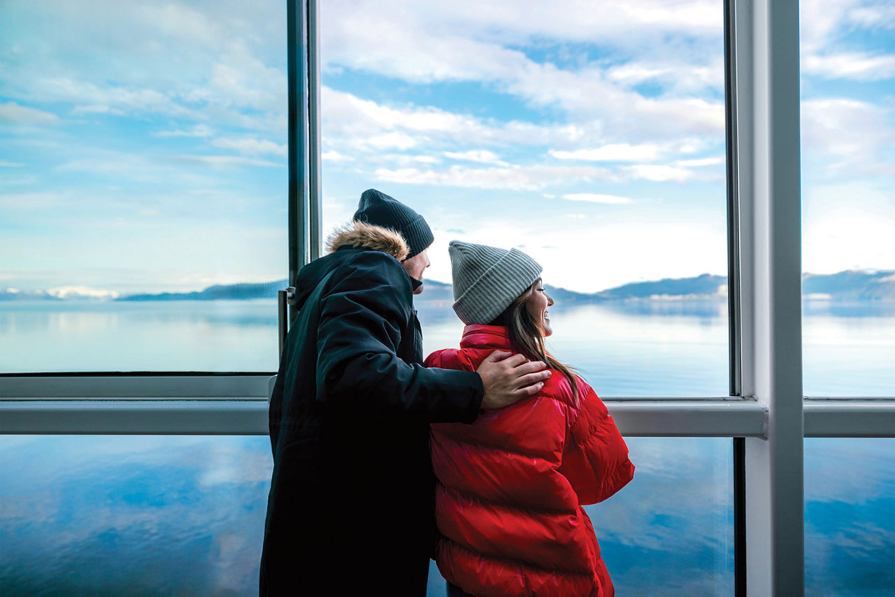 Couple in winter coat at Ovation of the Seas