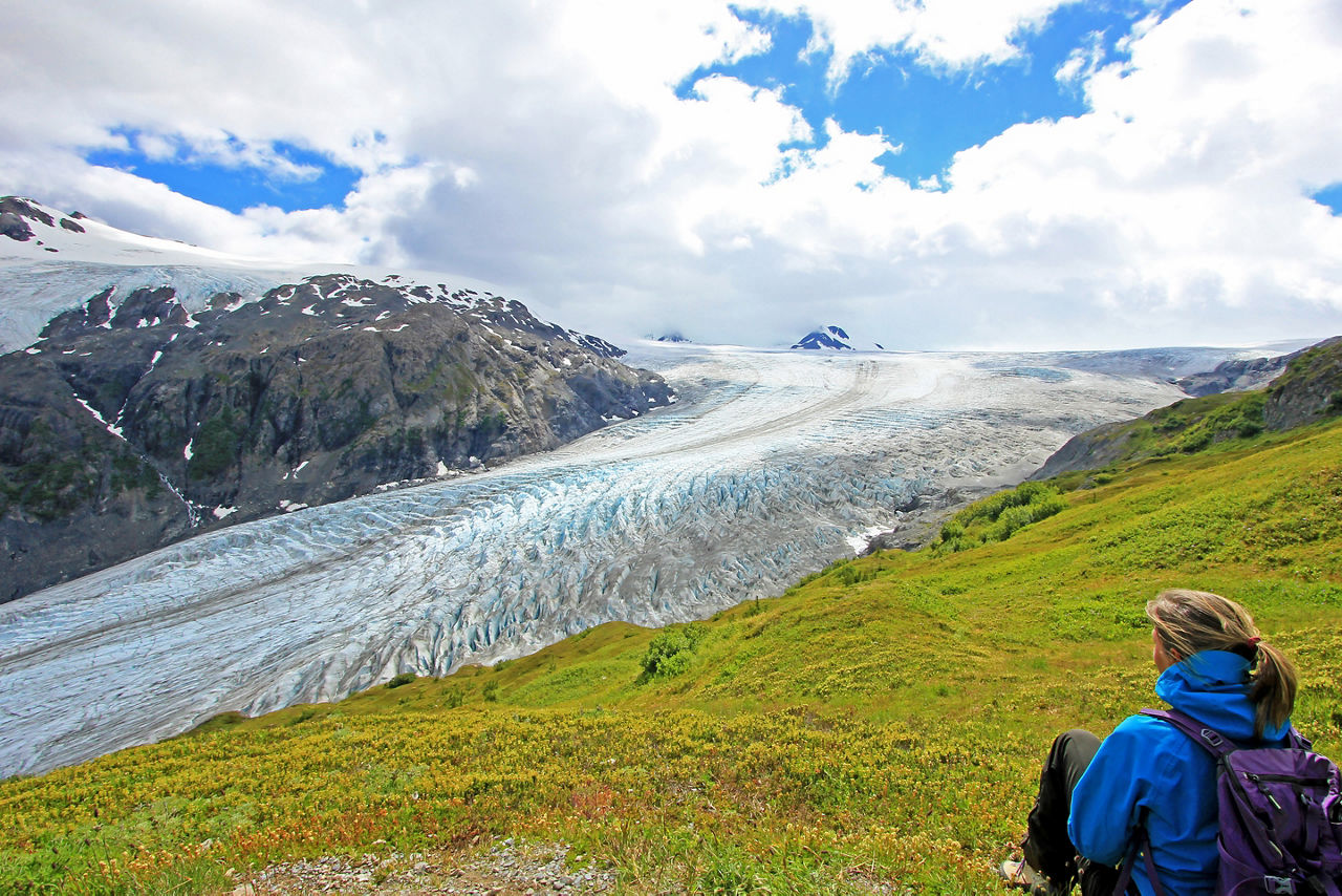 Woman looking at Exit Glacier, Harding Ice Field, Kenai Fjords National Park, Alaska