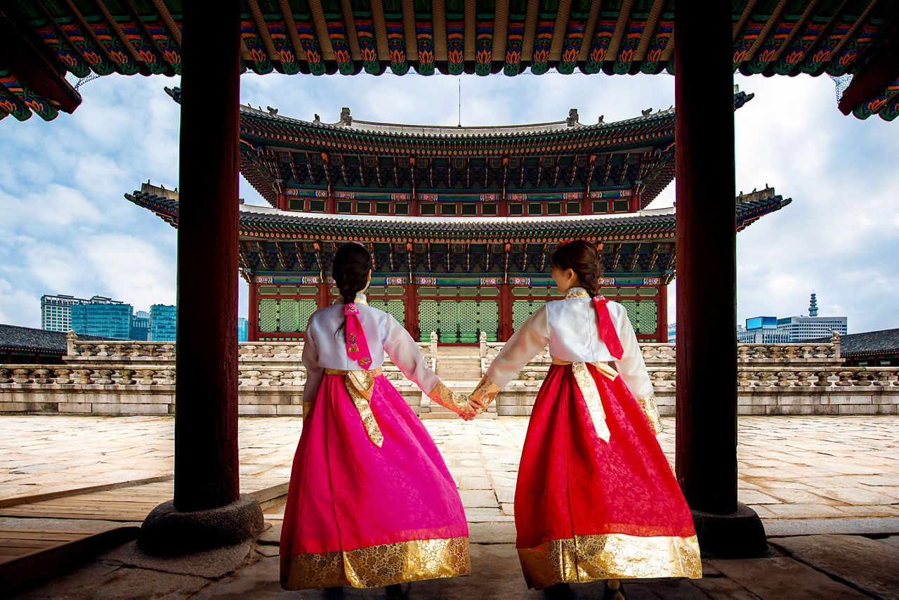 Women holding hands in Korea. Asia.