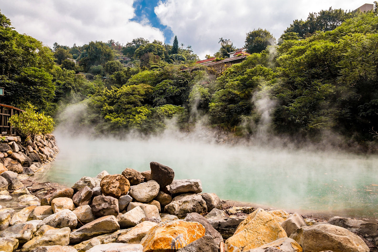 Jade‑colored steam rises from Beitou Thermal Valley, creating an otherworldly scene in northern Taipei. - Taipei, Taiwan