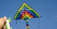 Vacation traveler flying kite high in the Australian sky. Australia