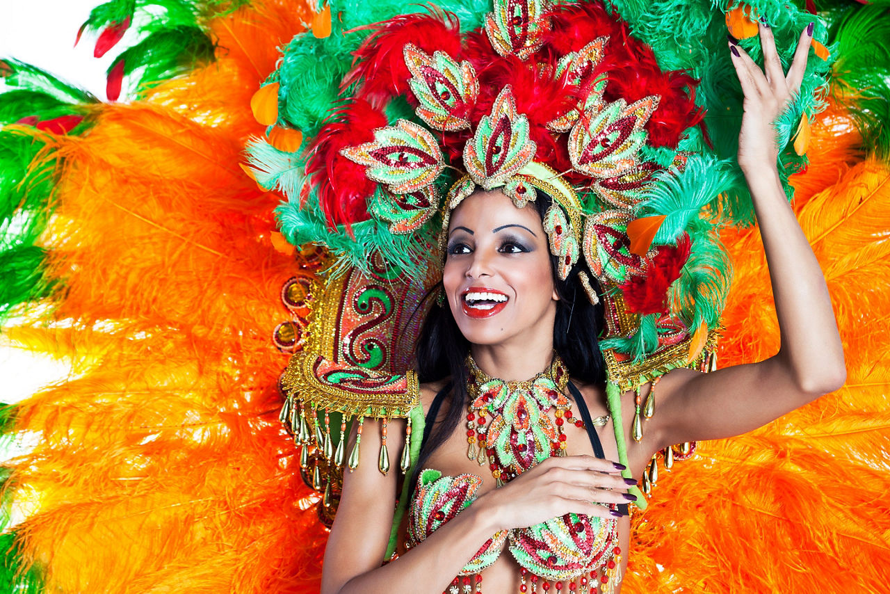 woman wearing an orange Brazilian samba costume for Carnival. Brazil.